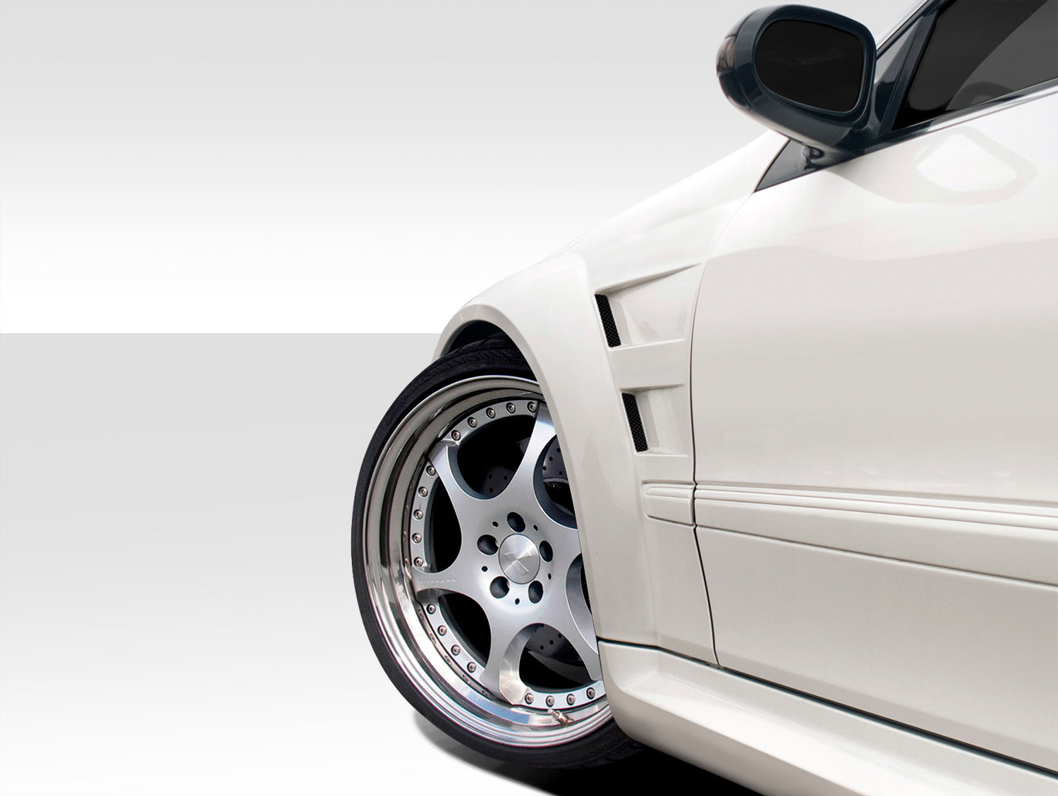 Get the Stunning 2003 - 2009 Mercedes CLK W209 Duraflex Black Series Wide Body Front Fenders (2 Piece Set)