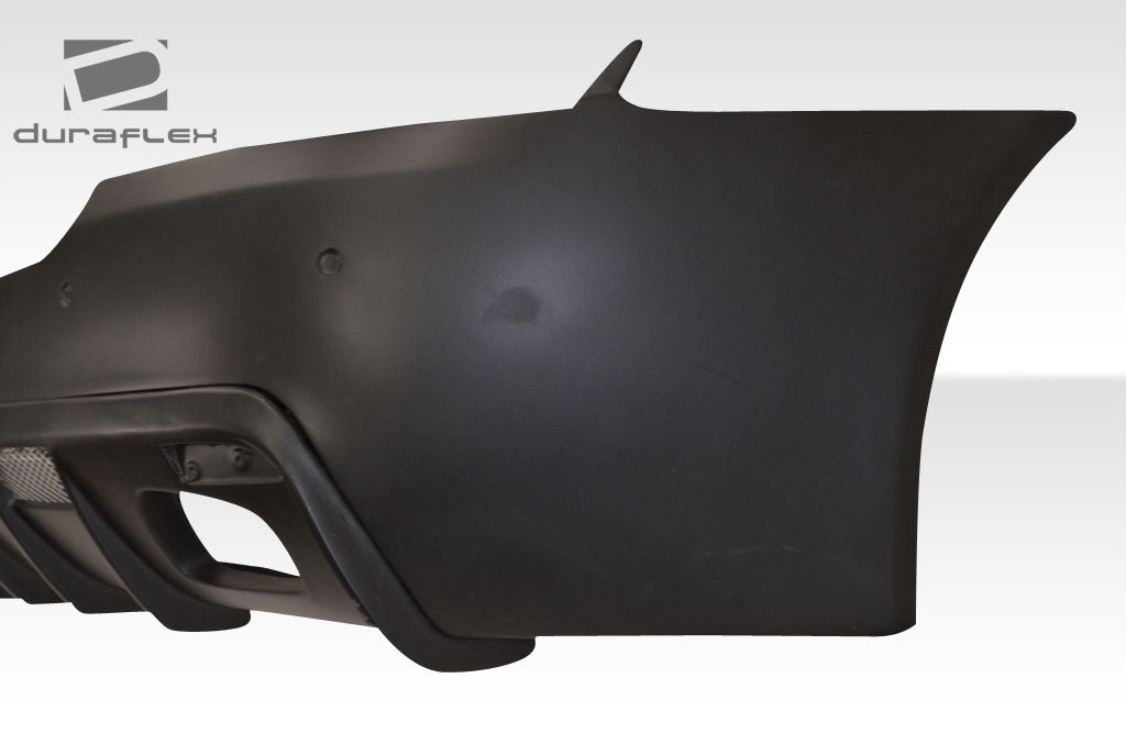 Upgrade Your 2004 - 2012 Aston Martin DB9 DBS with Eros Version 1 Rear Bumper Cover!