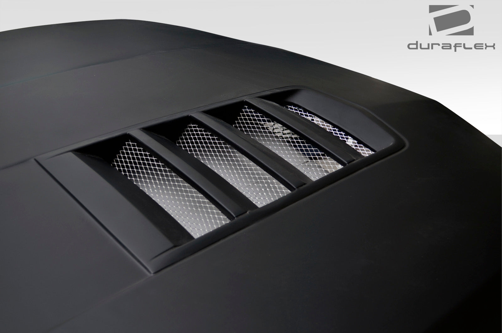 Unleash the Beast: 2010 - 2015 Chevrolet Camaro Duraflex Z28 Look One - Piece Hood